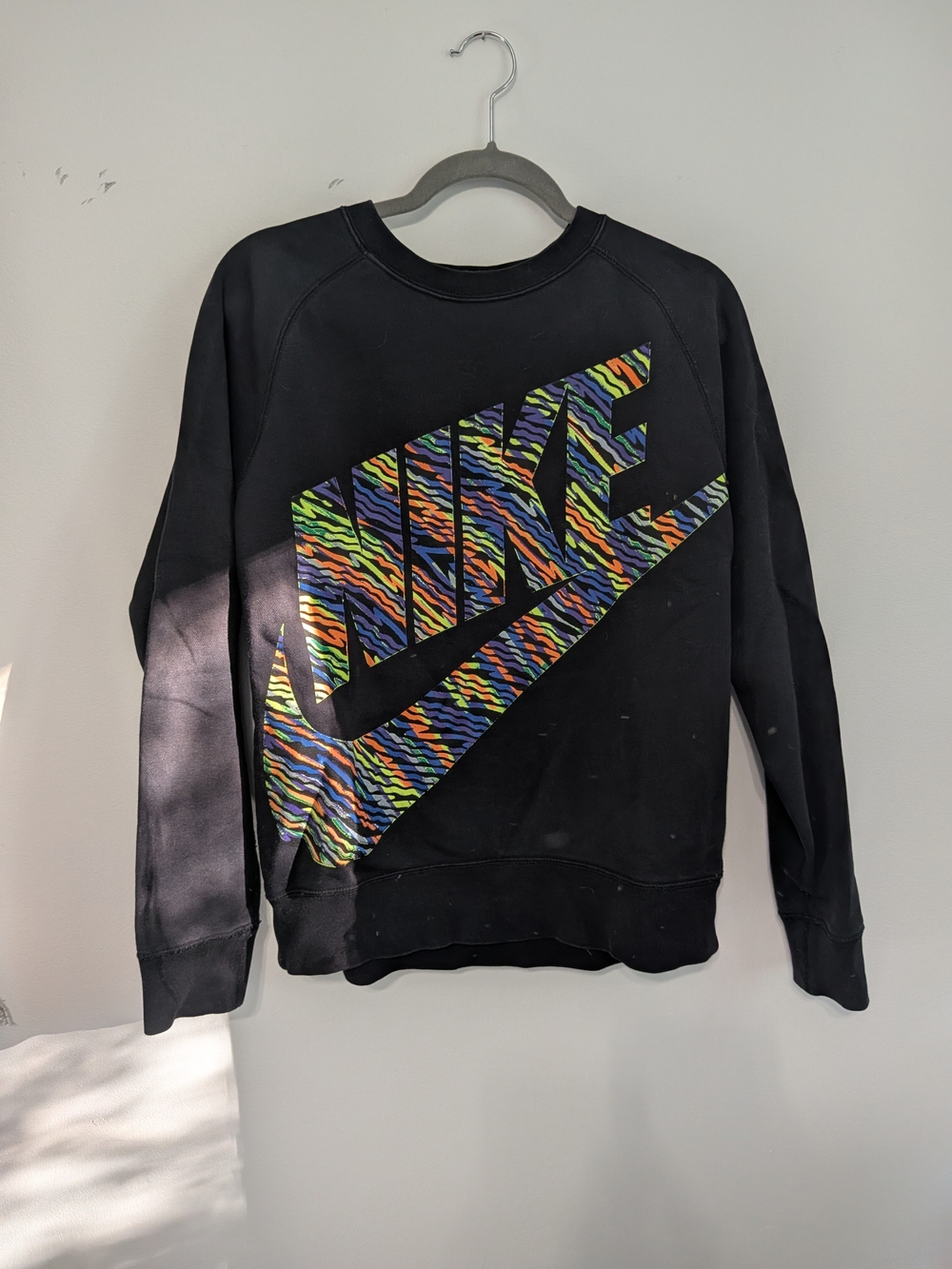 Unisex Nike Black Crewneck Sweatshirt with Multicolor Zebra Logo